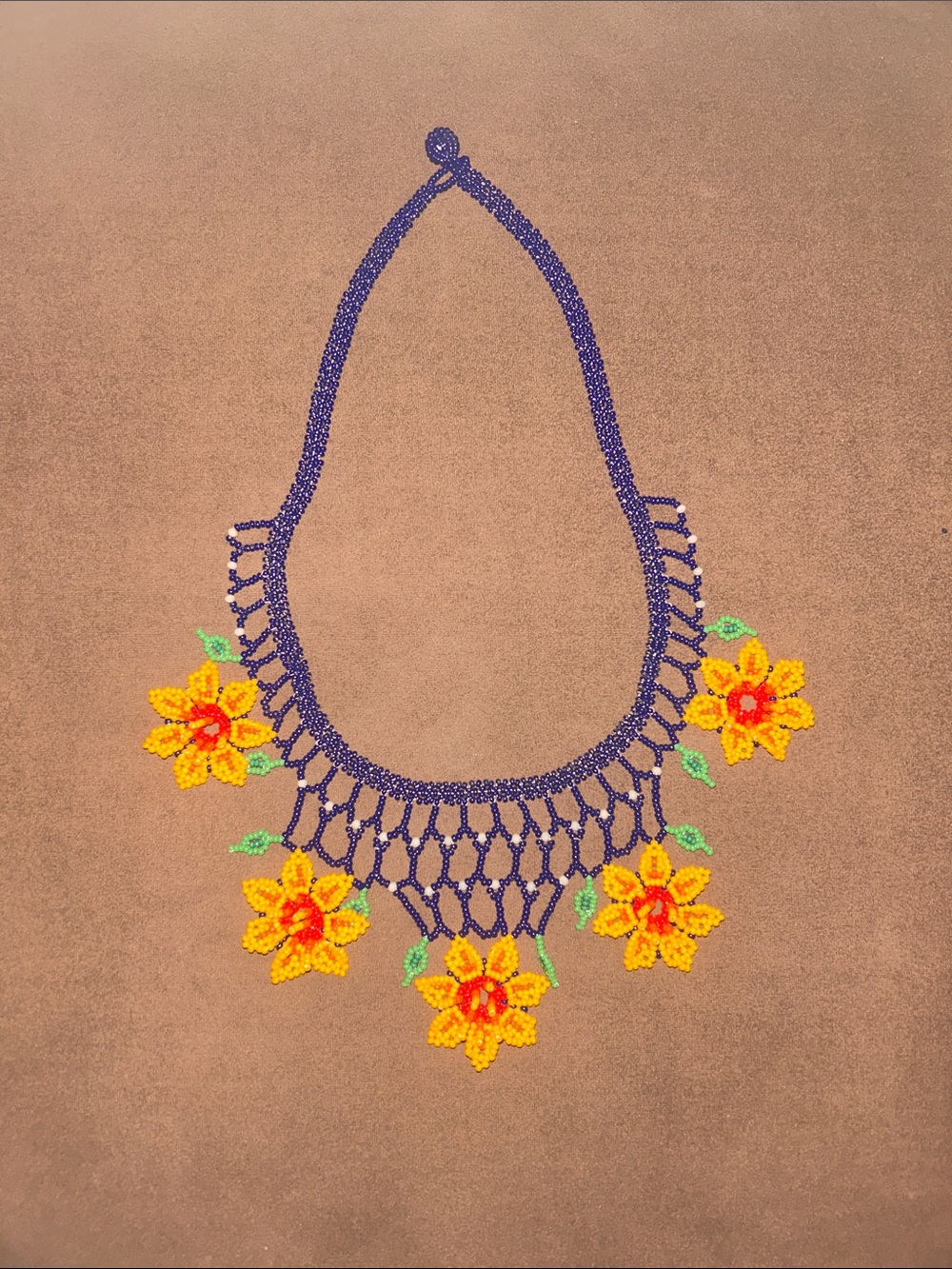 Handcrafted Purple Beaded Necklace with Yellow Flower Accents